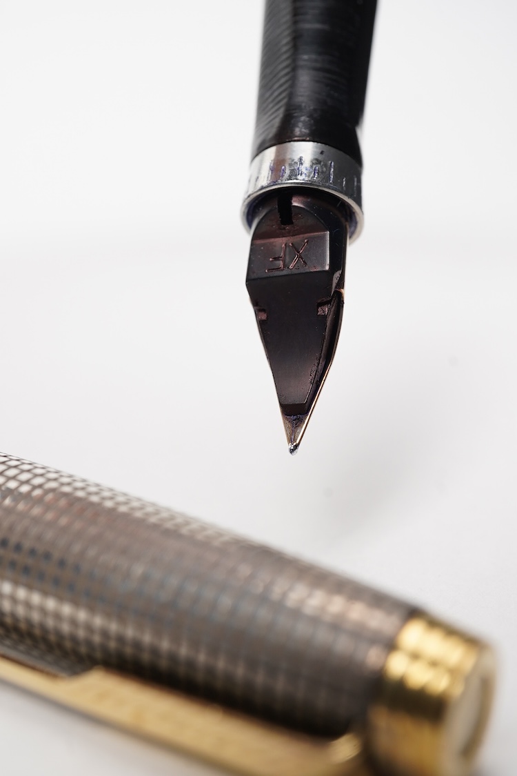 A Parker Sterling silver Cisele fountain pen and matching ballpen in original box along with a collector's pen case